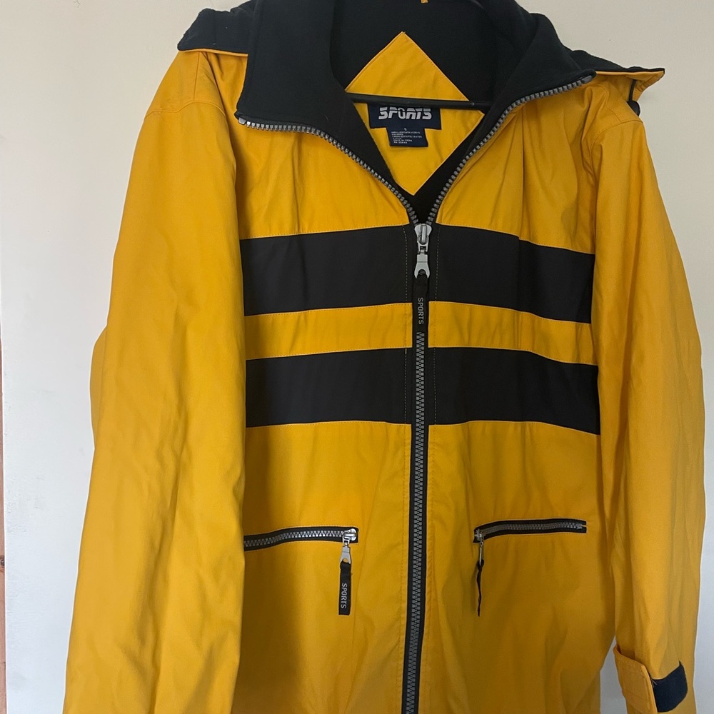 All weather SPORTS brand jacket. Polyvinyl outer shell and navy fleece. Sz S